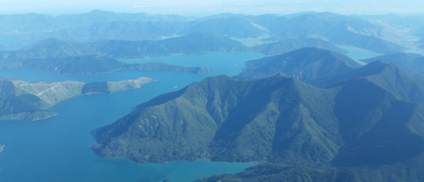 A picture of Marlborough sounds, with water between the hills