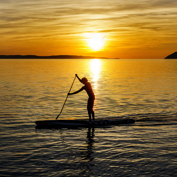 Person paddle boarding