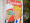 a poster on a wall, showing Donald Trump drinking disinfectant